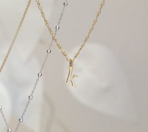 Lowercase initial necklace
